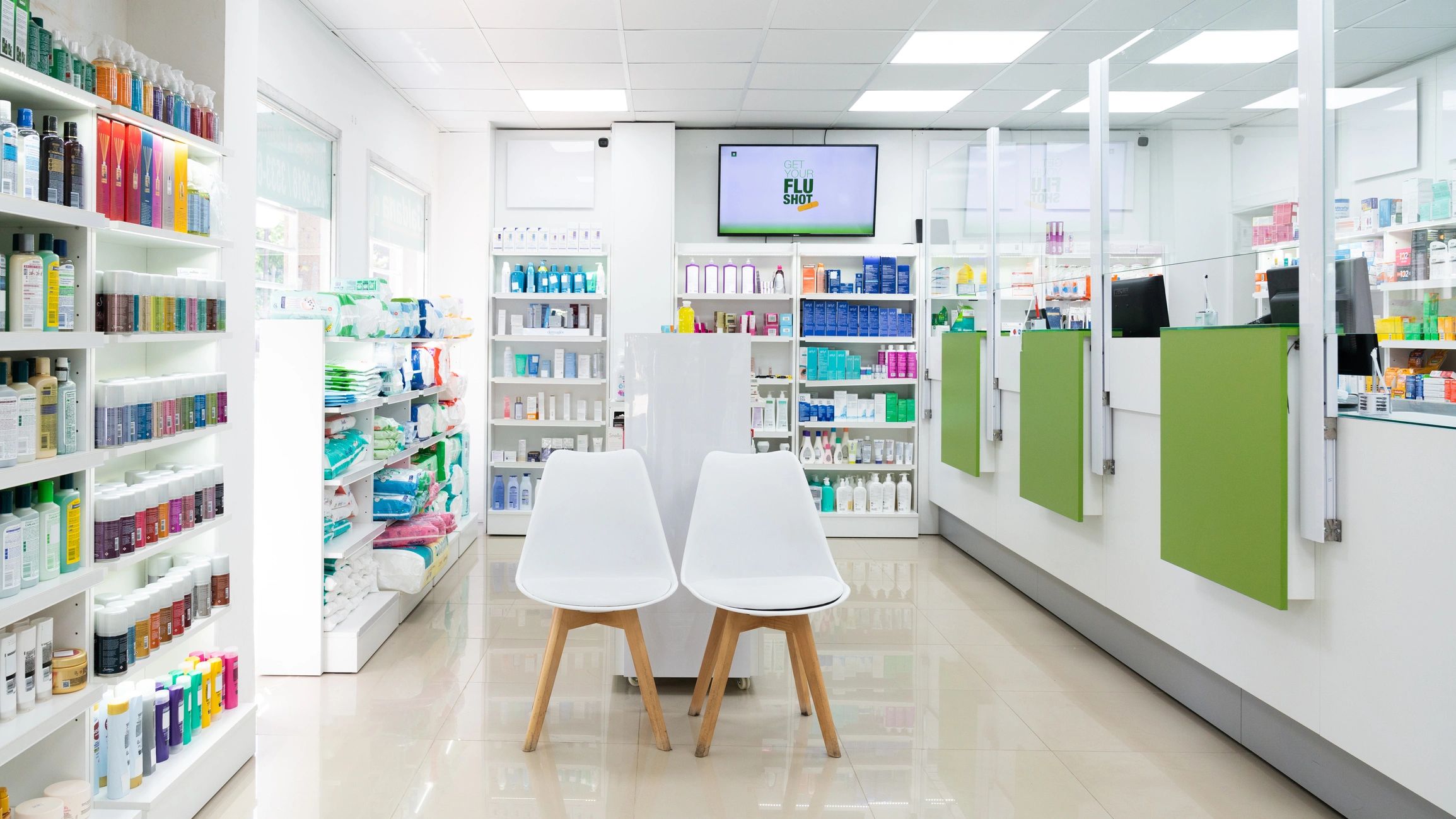 Organized pharmacy interior with checkout area