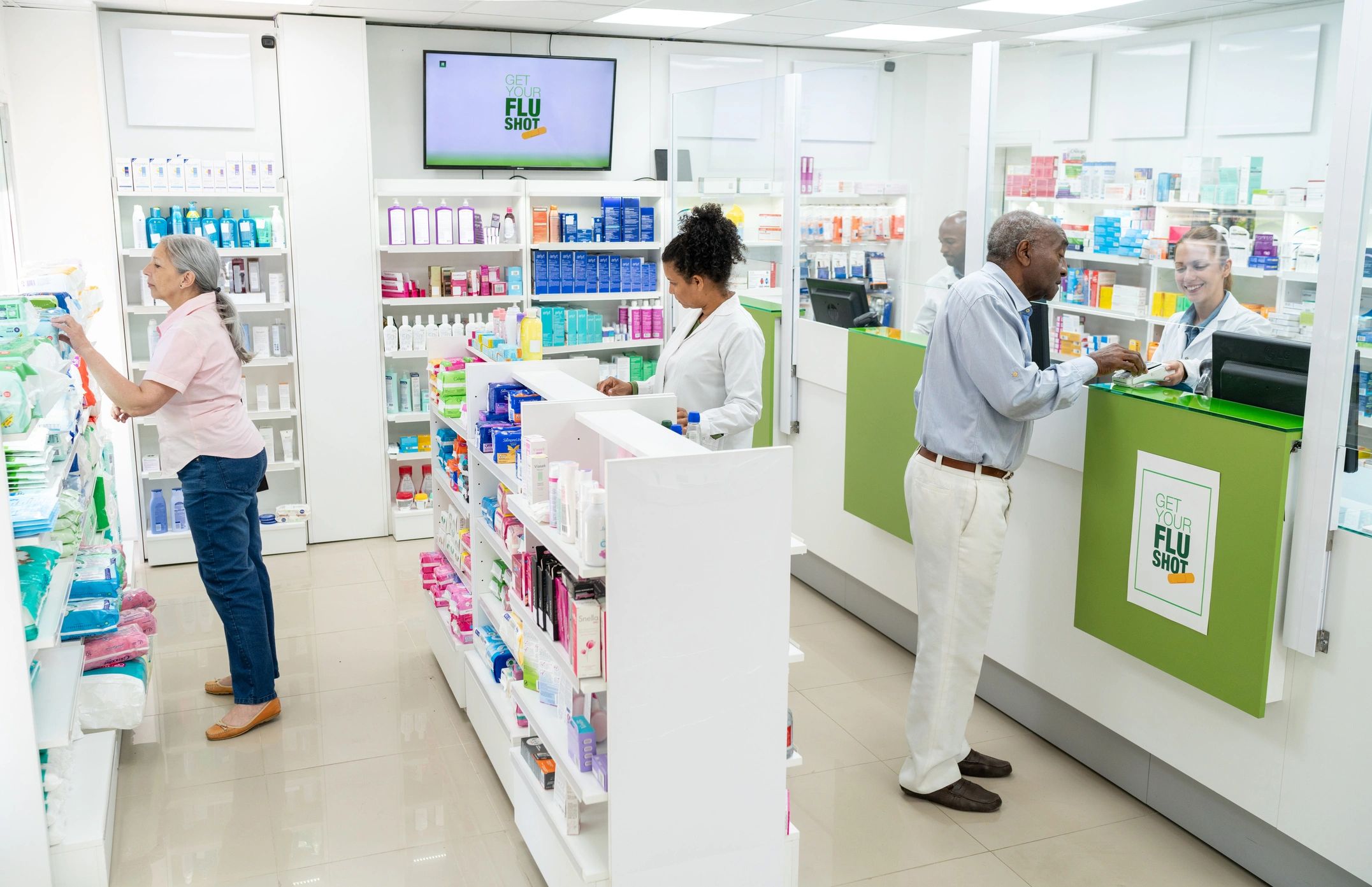Retail customer paying at a technology-enabled checkout counter