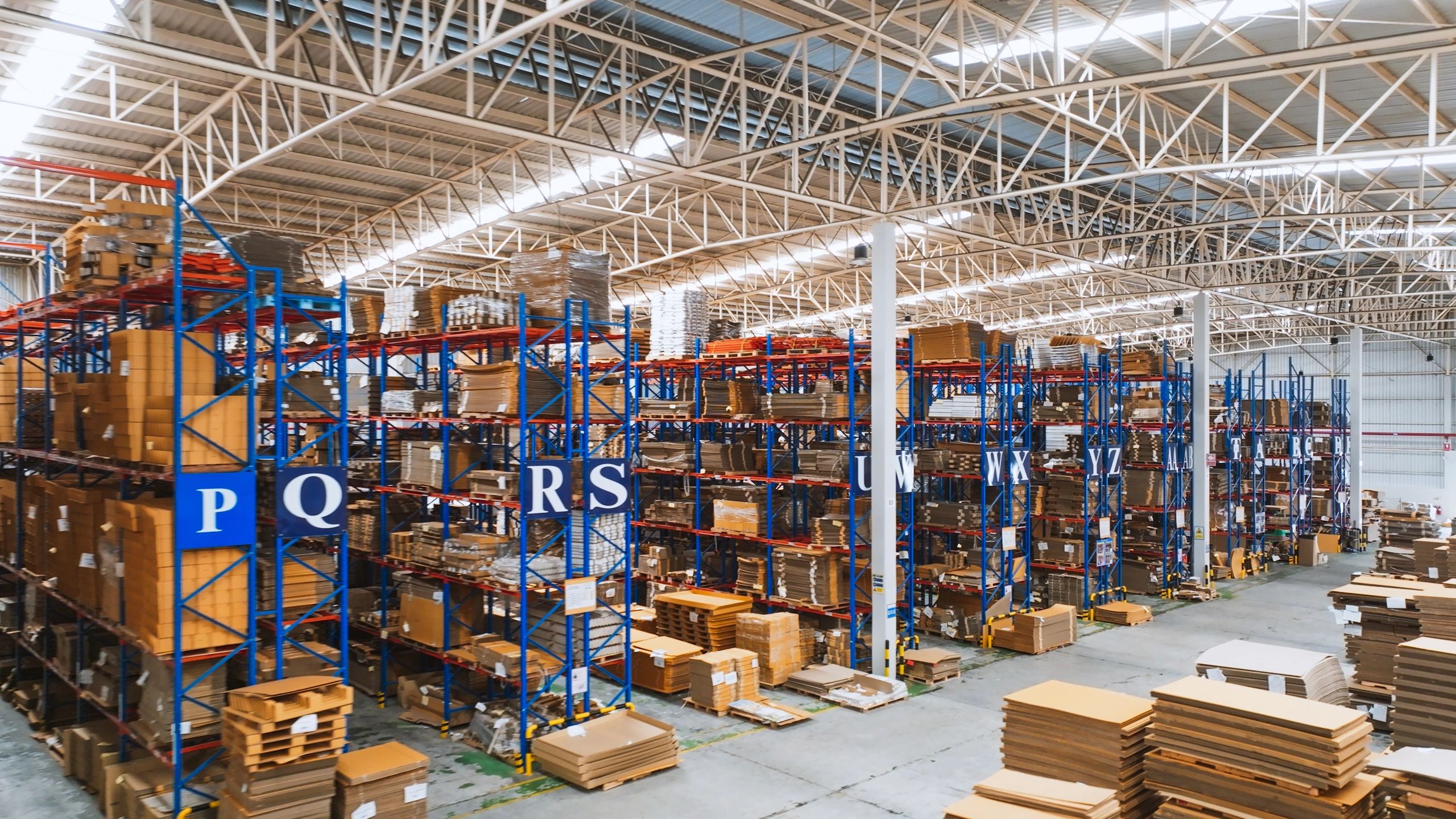 Warehouse shelves and packaged inventory for wholesale distribution