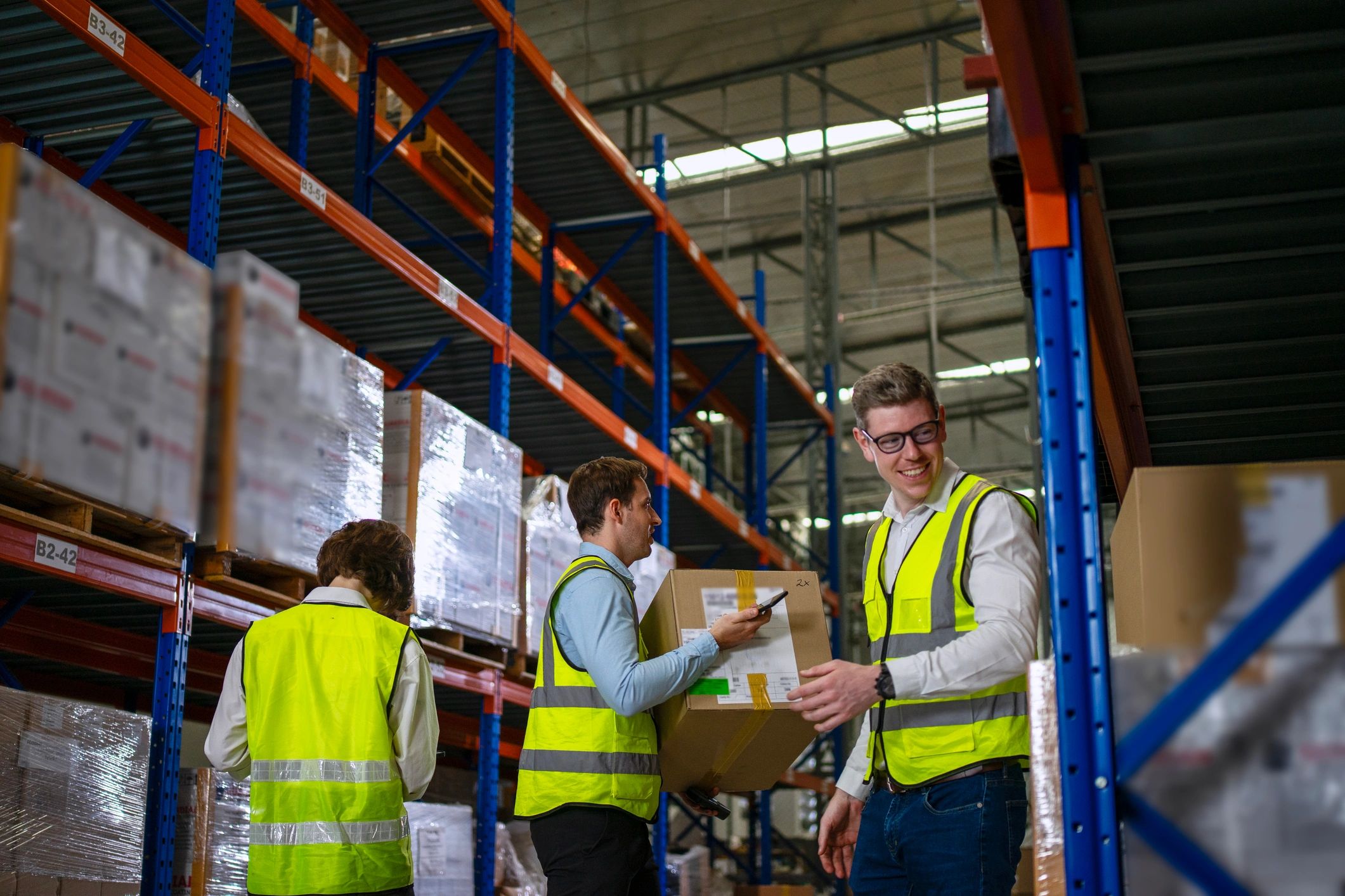 Warehouse and operations team supporting business technology logistics